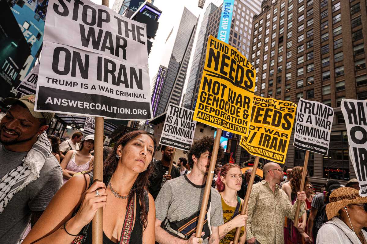 Trump strikes Iran: Hundreds take to the streets of Midtown Manhattan to protest unilateral bombings 7