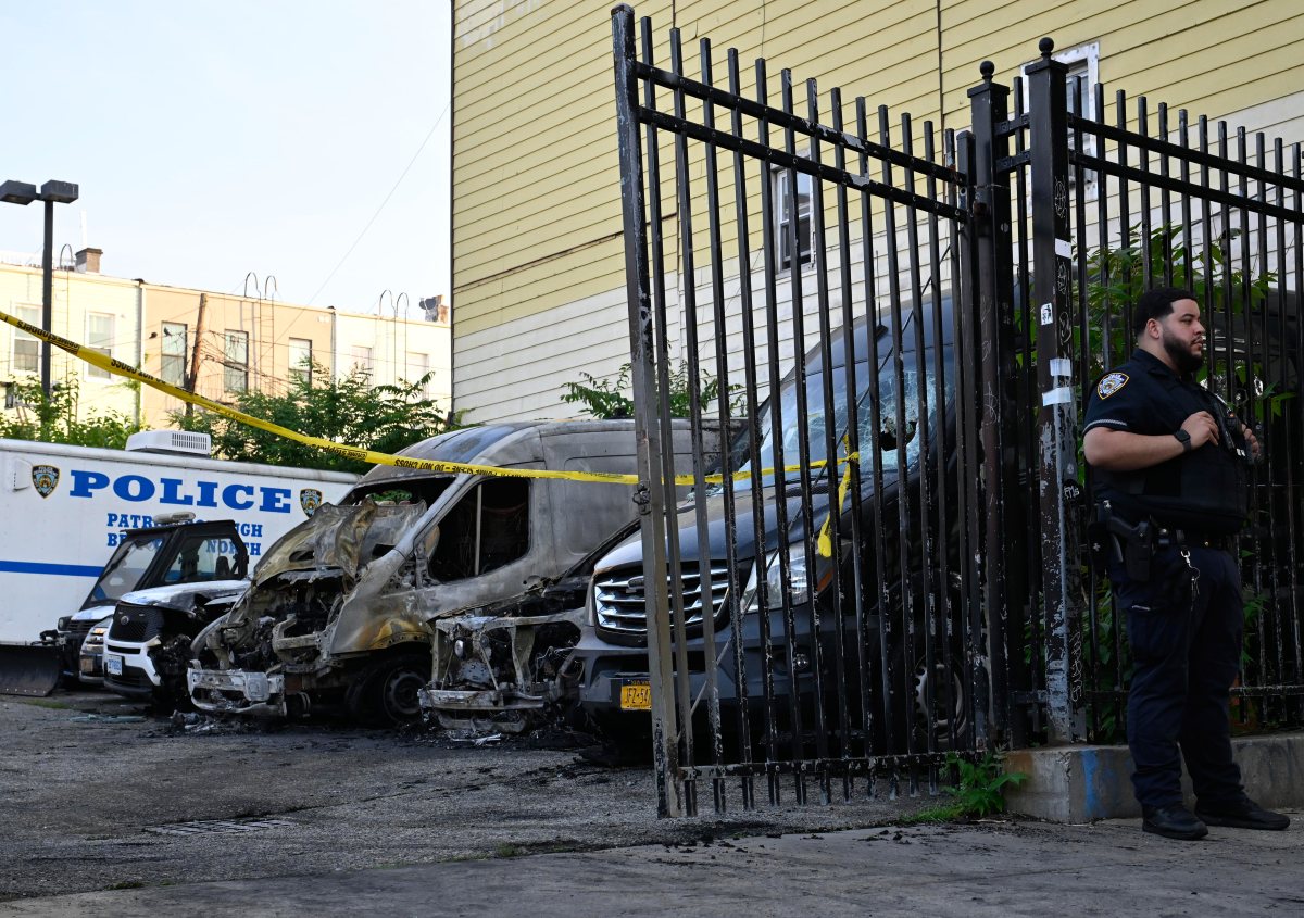 Arsonist who torched 11 NYPD vehicles in Brooklyn faces federal charges 2 Burned NYPD vehicles that were hit in arson attack