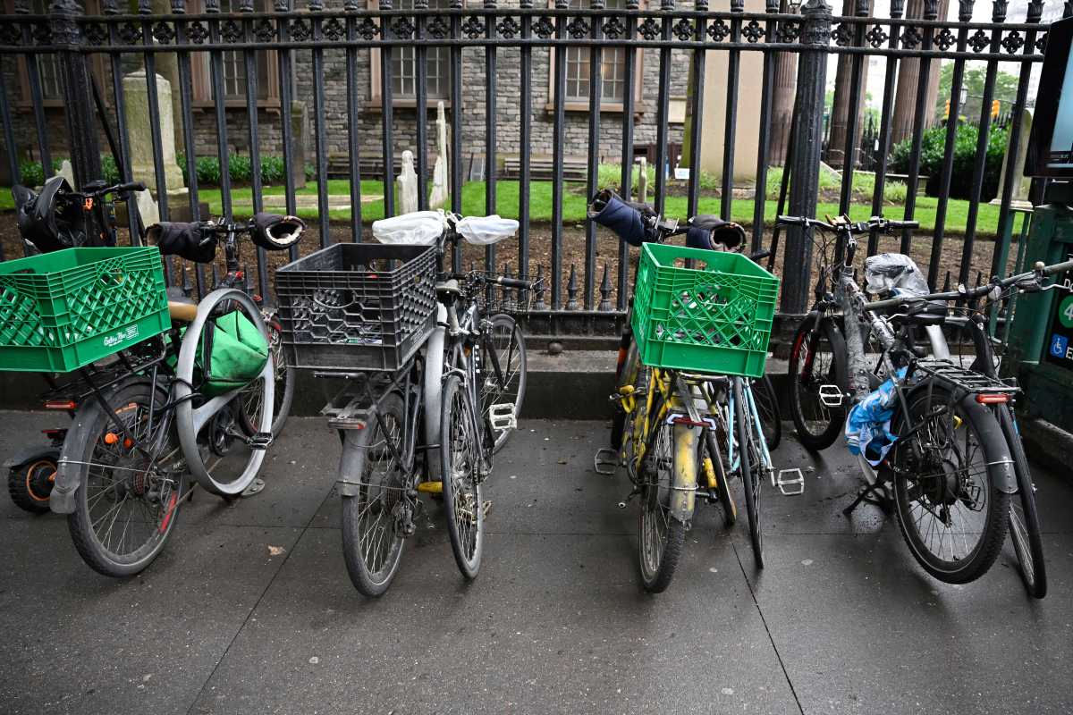 set of bikes on a sidewalk
