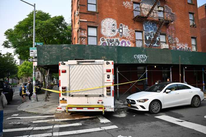 white truck and an apartment building in Brooklyn