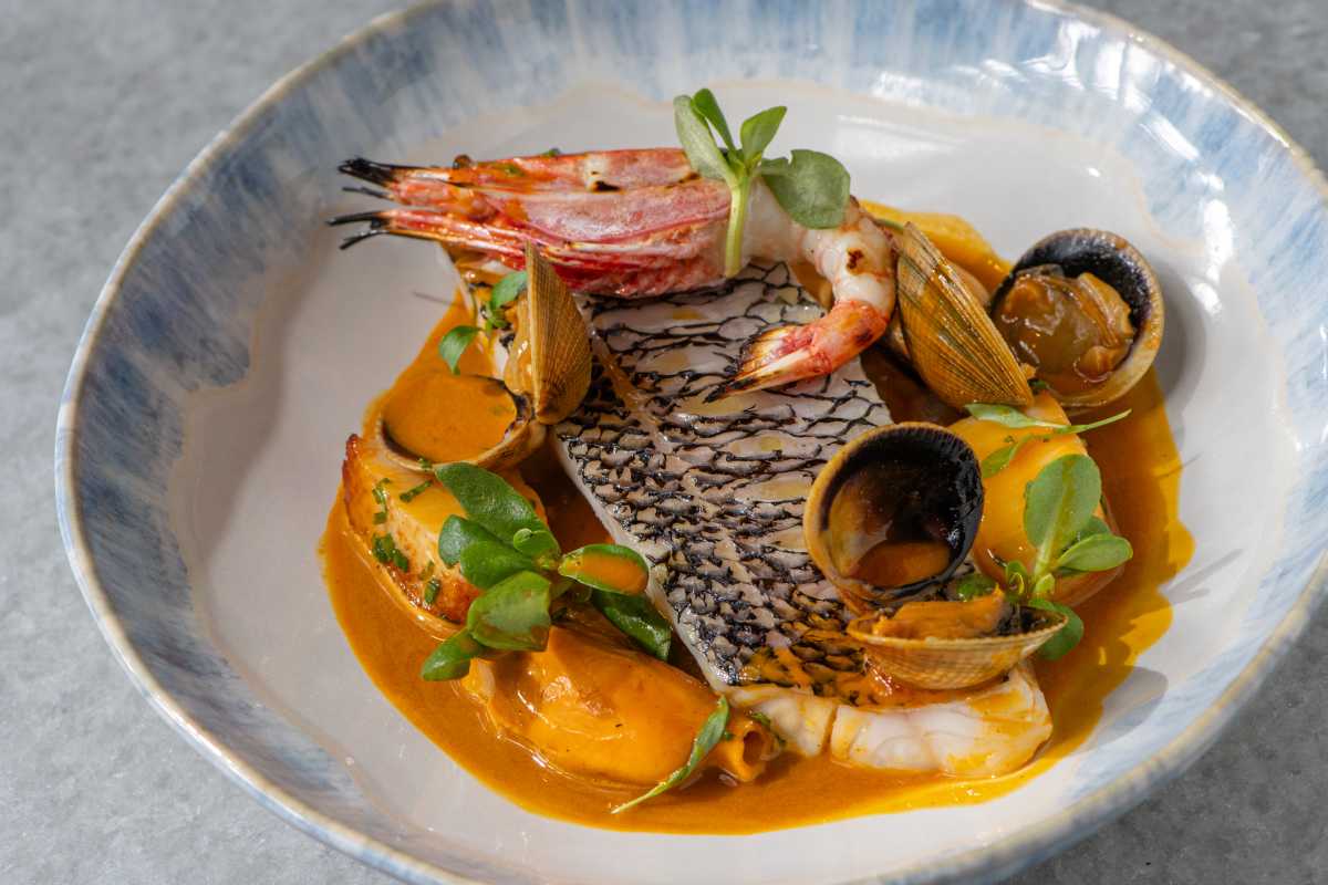an array of seafood dishes from Midtown's Point Seven