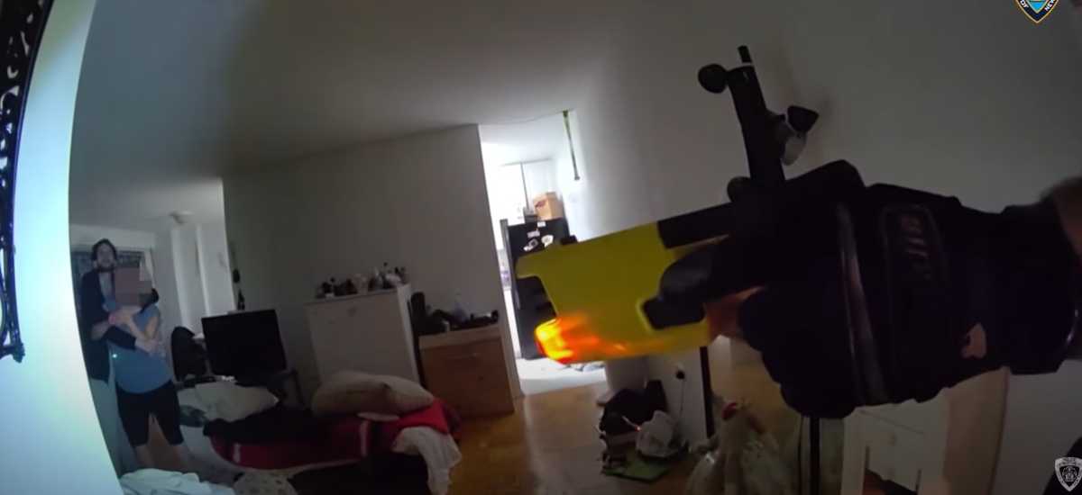 In this image taken from Officer Carlos Pecheco’s body camera, police confront Daniel Ribustello, 34, who held his mother at knifepoint inside a Pelham Bay apartment on May 1, 2025