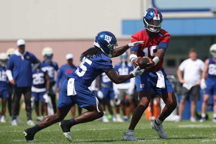 Jul 23, 2025; East Rutherford, NJ, USA; New York Giants quarterback Jameis Winston (19) and running back Dante Miller (25) during training camp at Quest Diagnostics Training Center.