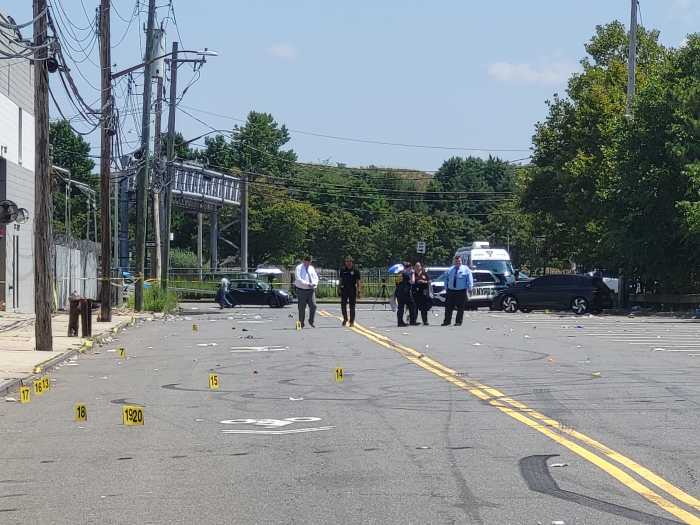 Police work the scene of a double fatal shooting near Ferry Point Park in the Throggs Neck section of the Bronx on Monday, July 28,