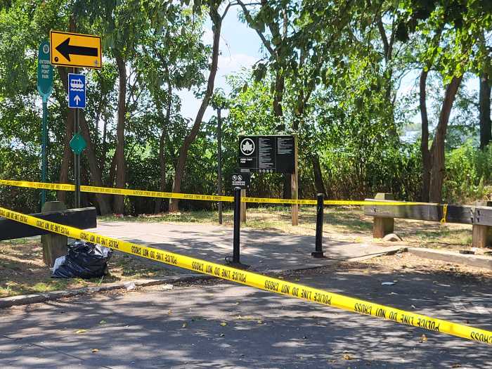 Police tape surrounds the scene of a double fatal shooting near Ferry Point Park in the Throggs Neck section of the Bronx 