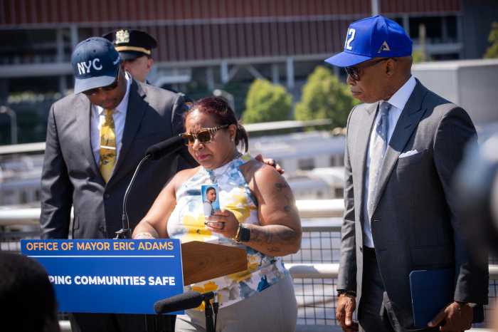 ‘Russian roulette on rails’: NYPD drones aided 200 subway surfing rescues since program launch, officials say 3 Norma Nazario holds up a funeral card for her 15-year-old son, Zachary, who died while subway surfing in 2023, during a press conference with city officials in Queens on Monday