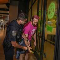 Climate activists arrested inside Moynihan Train Hall after they vandalize Meta offices 8 police officer arrests man who vandalized Meta office in climate protest with green paint