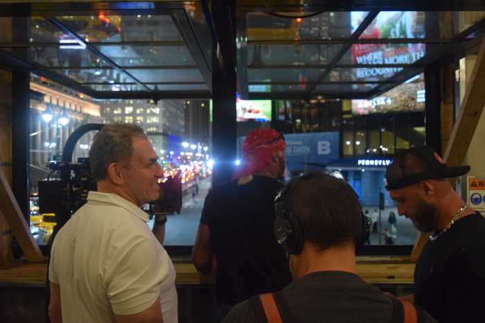 Hulk Hogan and owner Rich Rosen overlook Madison Square Garden from inside Slam. Hogan was joined by a documentary crew at the time. 