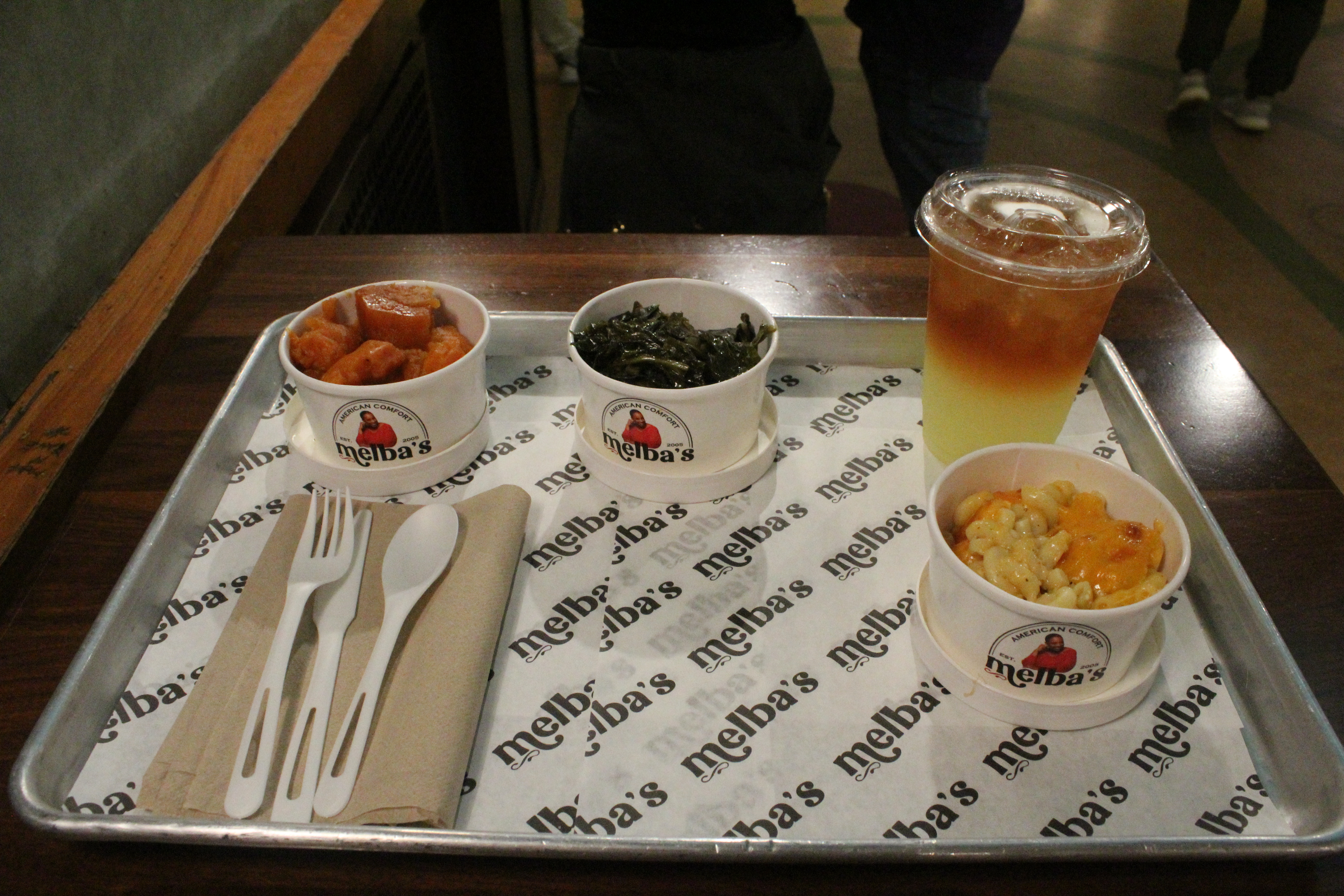 Melba’s sweet potato wedges, collared greens, lemonade, and mac and cheese.
