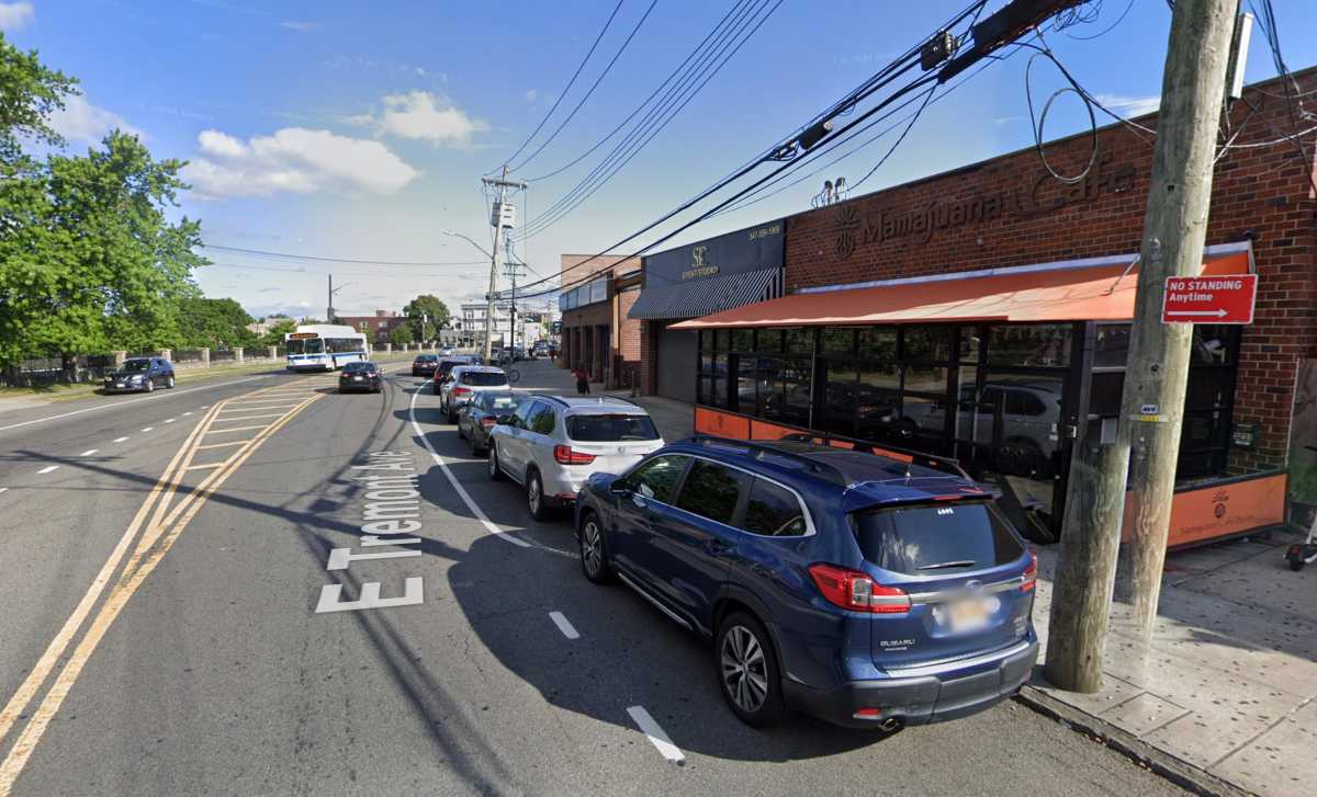 cars parked on street in front of bronx cafe where hit-and-run occurred