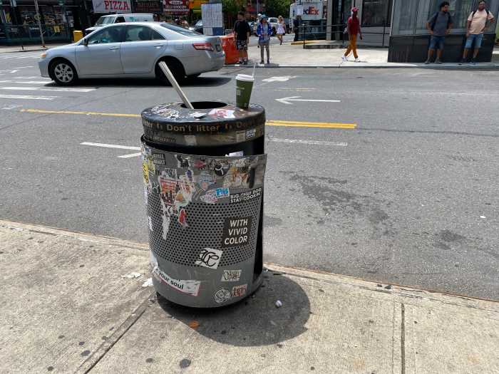 Trash talk: What's NYC doing about overflowing public litter baskets full of waste? 3 a public garbage can vandalized with graffiti