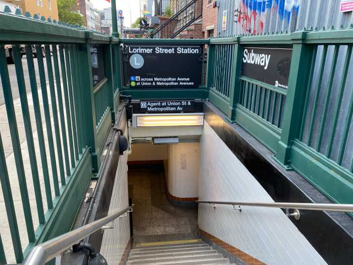 Fare evasion: A Brooklyn subway station becomes a hotbed for bold people cheating the system 3 the entrance to a subway station with stairs