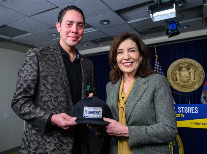 'We followed the rules': 12 NYC cannabis businesses sue state to block school-distance rule change 3 Osbert Orduna, CEO of The Cannabis Place, with New York Gov. Kathy Hochul at a Feb. 24 event announcing the state’s efforts to crack down on the illegal cannabis market. Hochul is not named as a defendant in the lawsuit challenging the state’s reinterpretation of its school-distance rule.