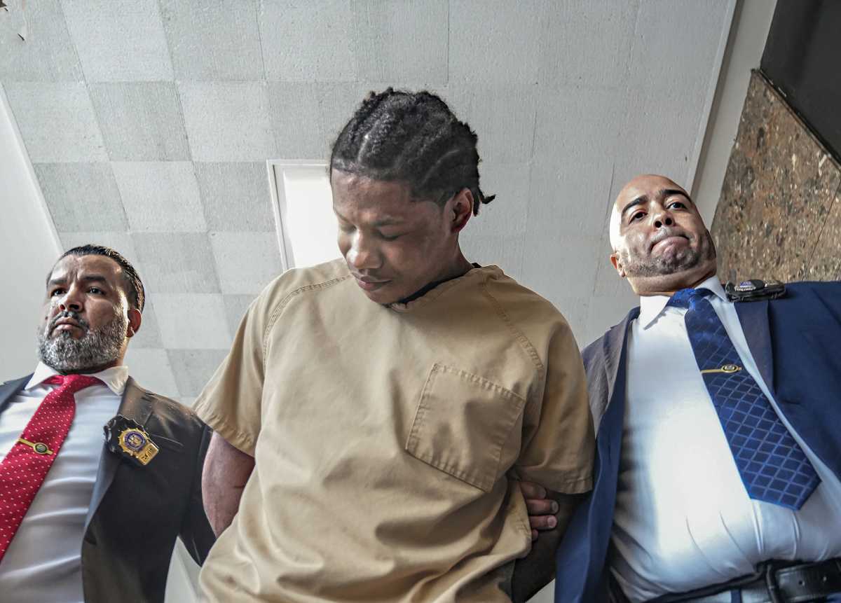 suspect accused of shooting border patrol agent bows before camera