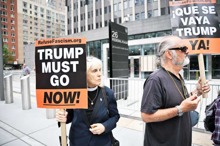 Rev. Este Gardner joins a protest outside 26 Federal Plaza on Aug. Gardner said she came to the courthouse seeking information about a detained congregant and decided to join the demonstration in solidarity.