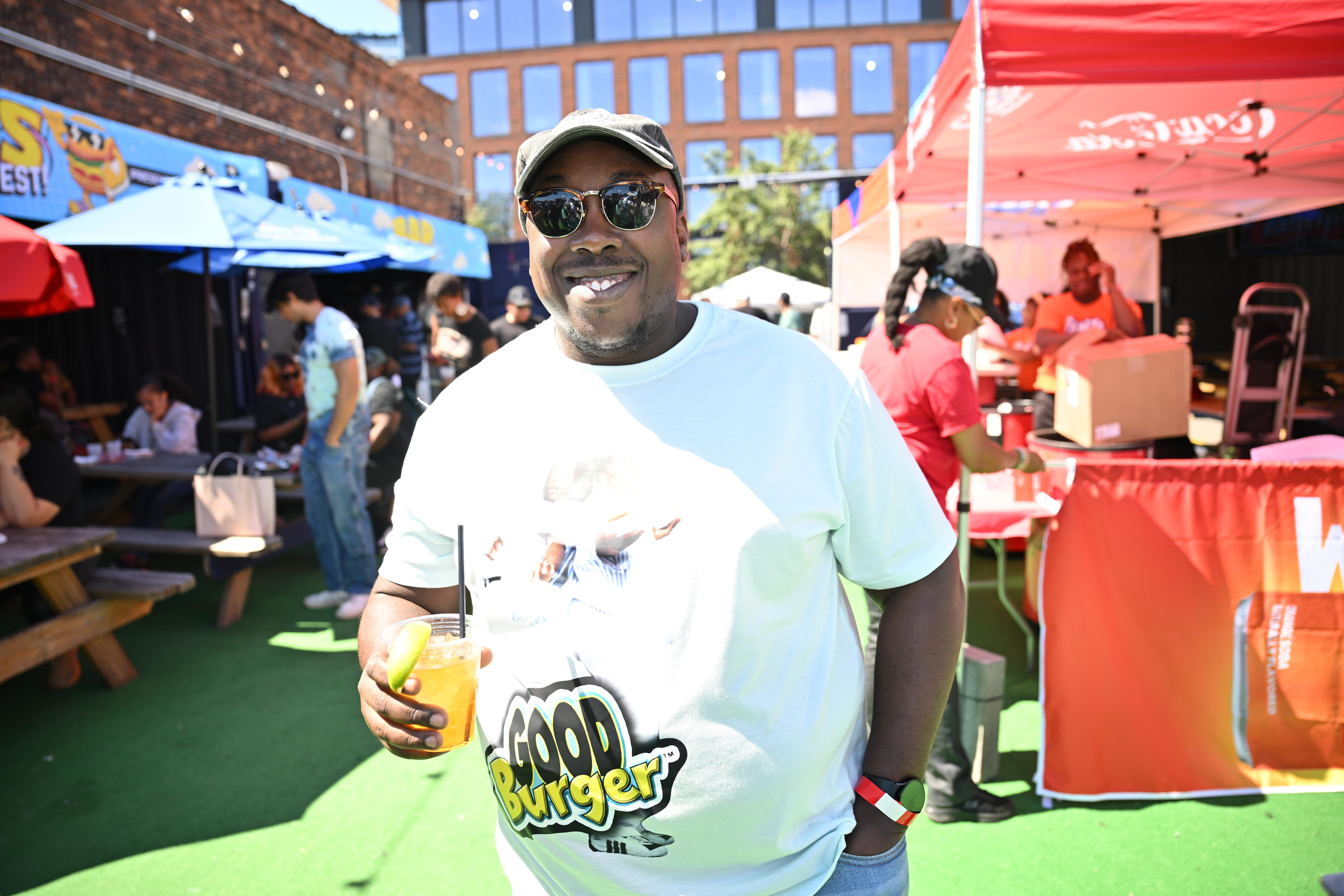 A fan wears a "Good Burger" shirt to Kel's Burger Fest.