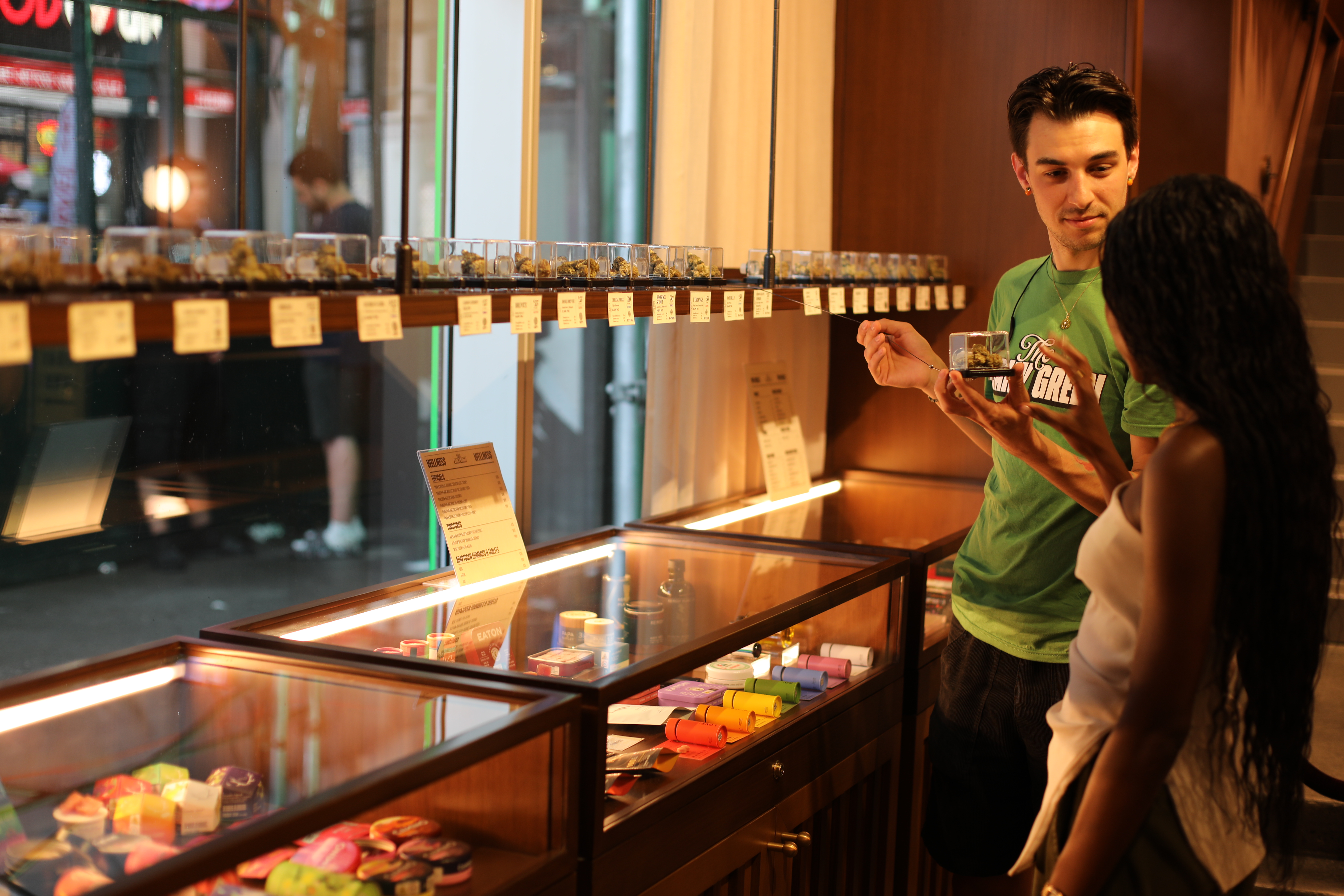 The Daily Green opens in Times Square, bringing news motif to cannabis dispensary 3 a customer and bud tender at the daily green