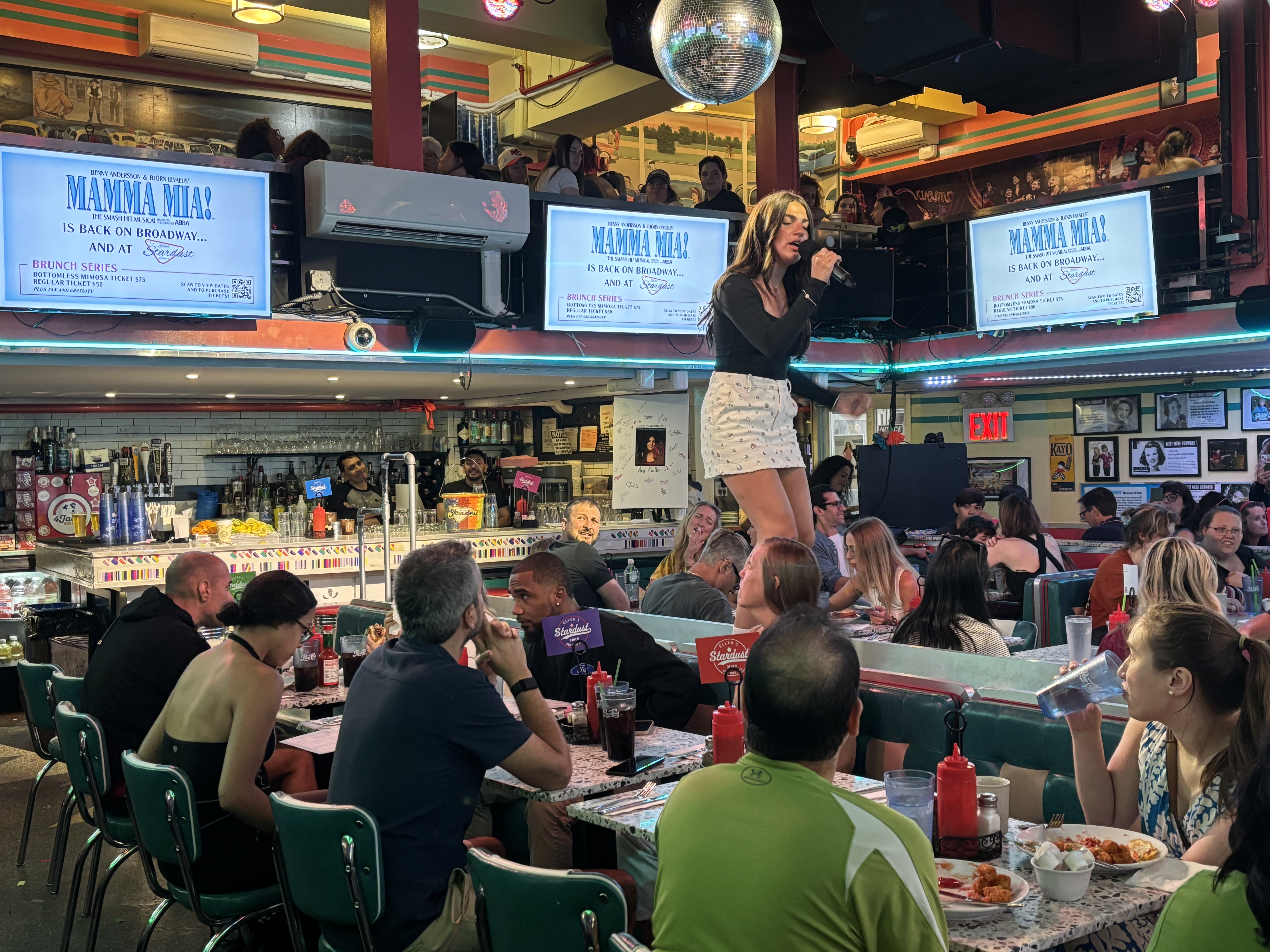 Ellen’s Stardust Diner junior winners get Broadway breaks 3 Ava Gallo sings at Ellen's Stardust Diner.