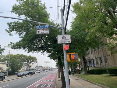 signage on a street in Staten Island during the day