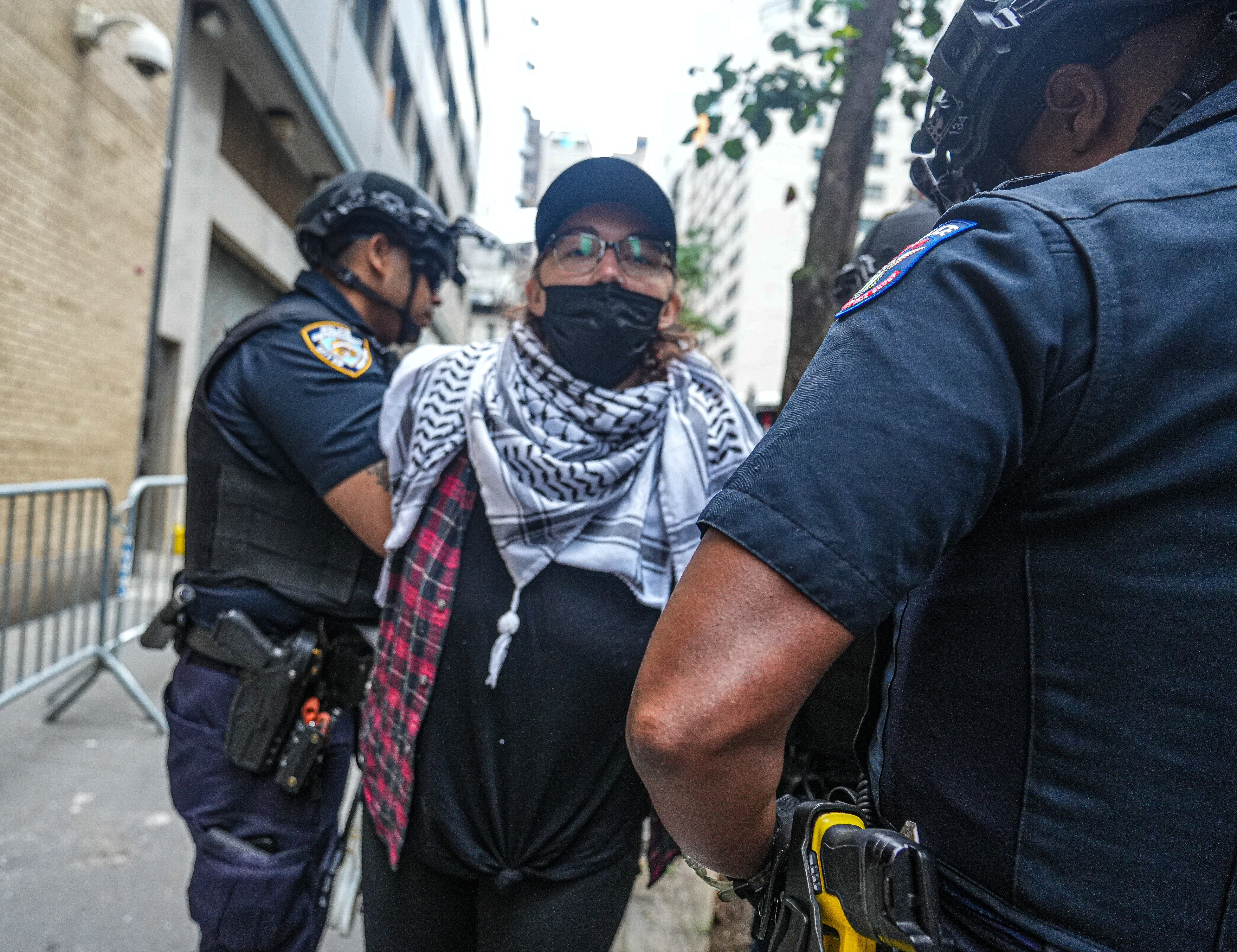 Five pro-Palestine protesters in custody after chaining themselves to UN's Permanent Mission of Egypt building in Midtown 4 NYPD arrests a protester in Midtown.