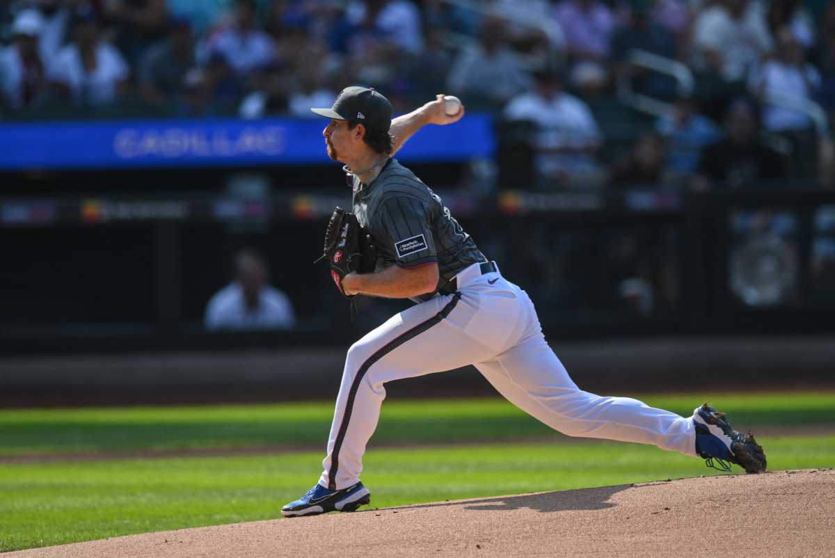 Nolan McLean gives Mets the spark they needed in debut - both on the mound and in the clubhouse 2 Mets pitcher in gray uniform throws pitch offf mound