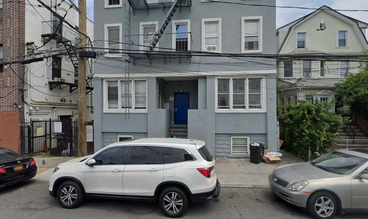 House with car in front at Queens murder scene