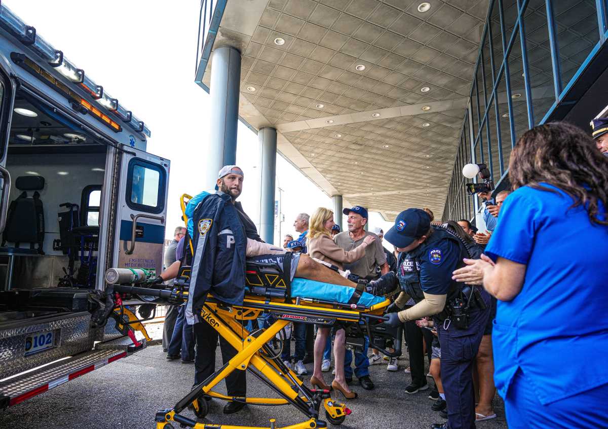 NYPD detective shot by 'friendly fire' while responding to Queens carjacking released from hospital as suspect is charged 3