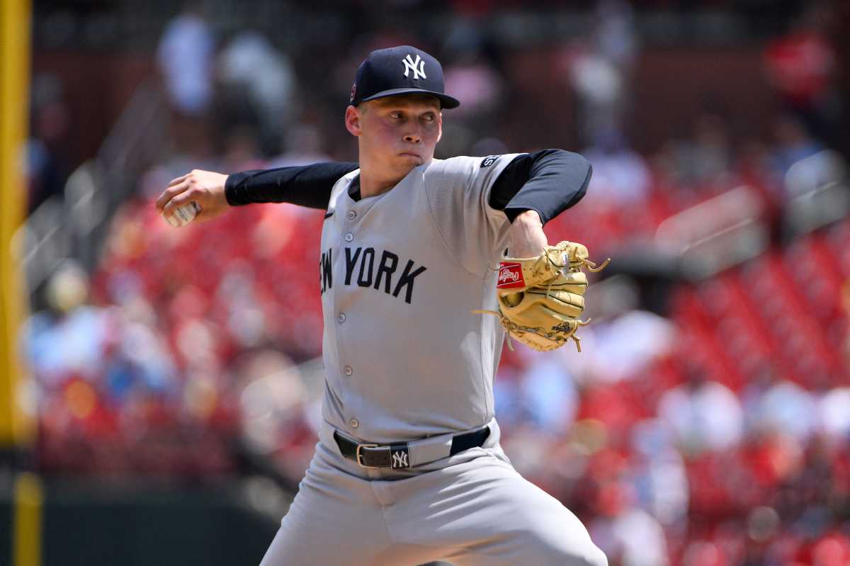 Yankees enjoy 'sweep' success in scorching St. Louis with late heroics to beat Cardinals 2 Yankees pitcher throwing ball